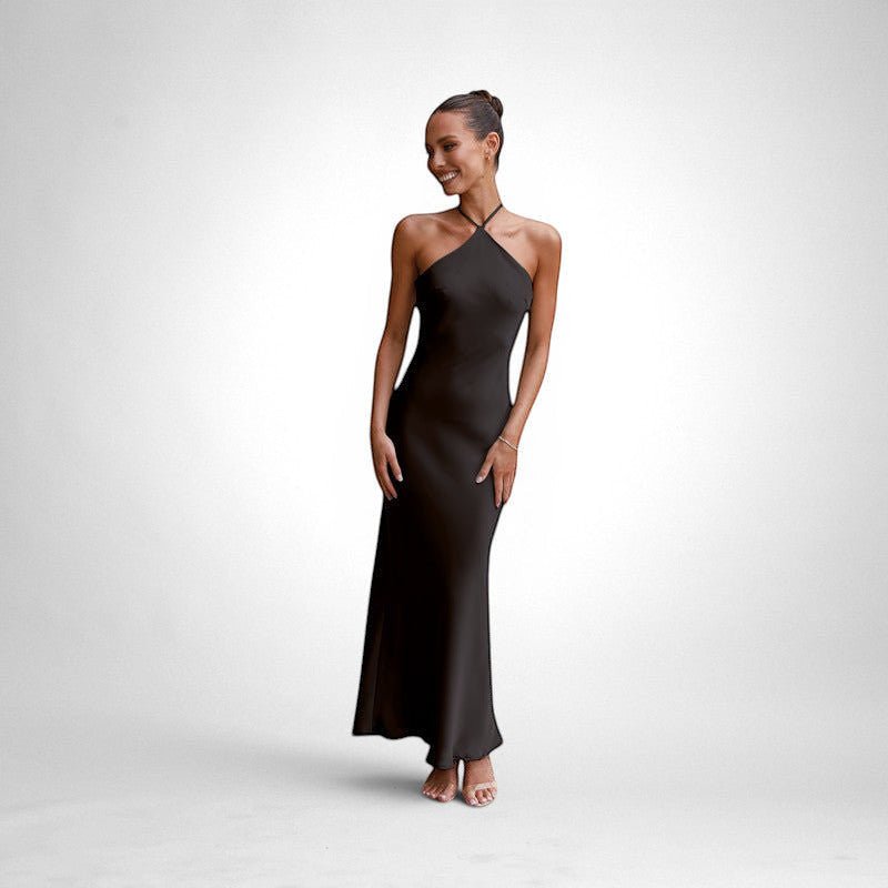ZOFIA ATELIER black sleeveless backless maxi dress made of polyester with a slim fit and halter neckline.