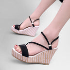 ZOFIA ATELIER black suede platform wedge sandals with woven espadrille detail and ankle straps.