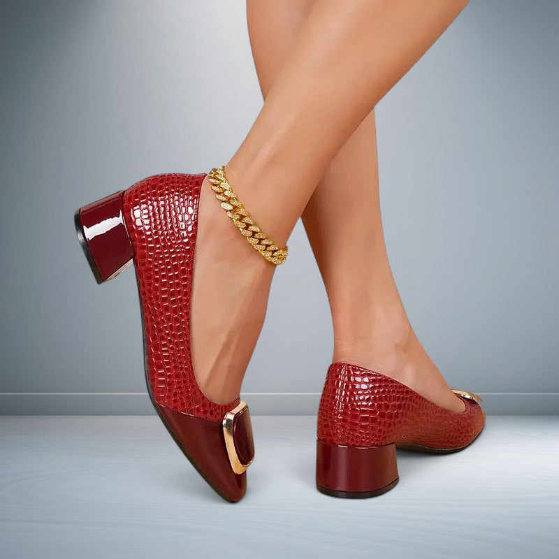 ZOFIA ATELIER burgundy square toe chunky heels with gold buckle detail and embossed texture.