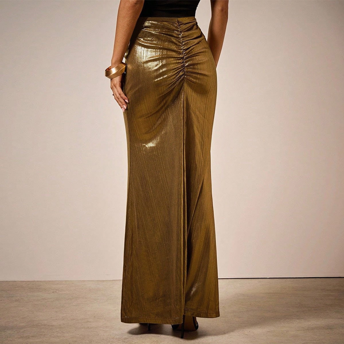 ZOFIA ATELIER gold pleated long skirt with ruched detail and moderate stretch, perfect for evening wear.