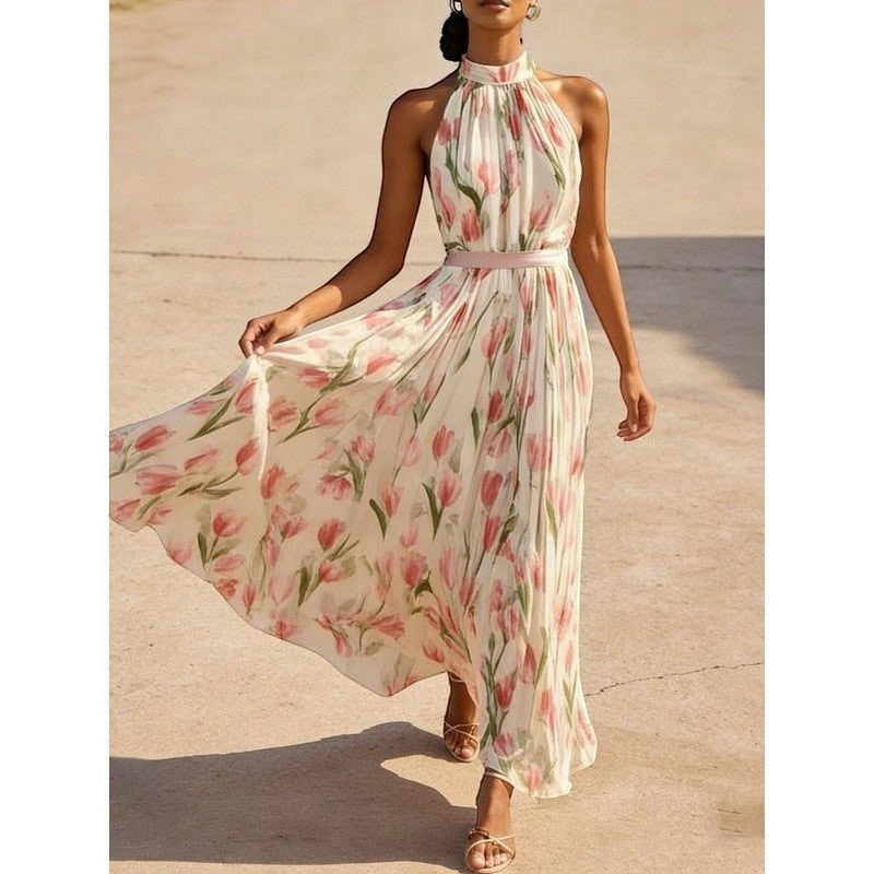 ZOFIA ATELIER WIKTORIA halter swing maxi dress in cream with pink floral print, pleated skirt, and pink sash.