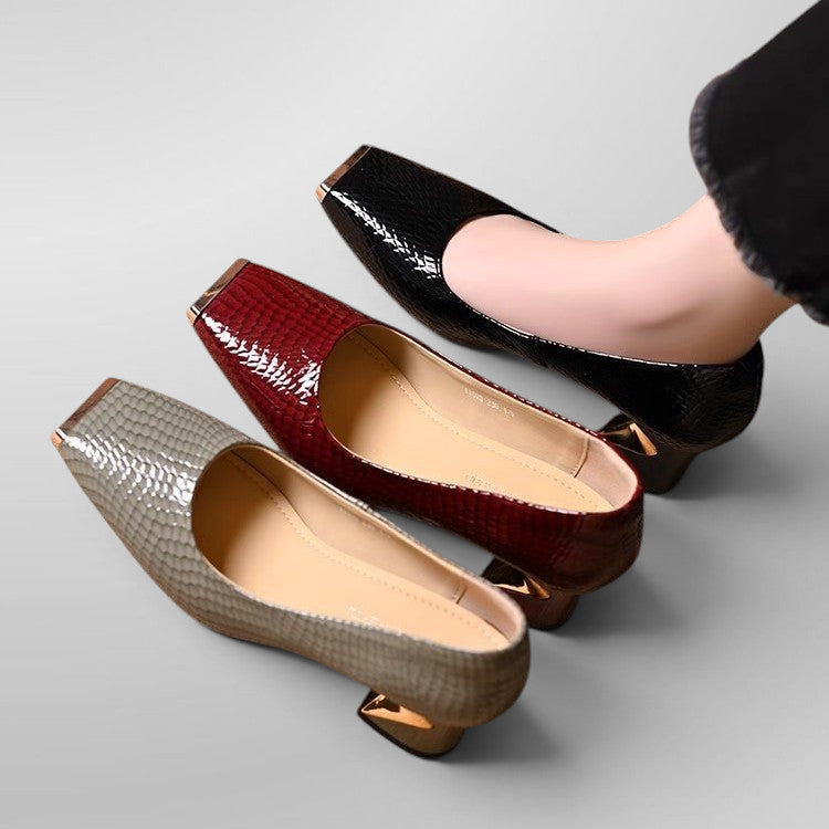 ZOFIA ATELIER Krystyna snake pattern square toe chunky heel shoes in black, red, and gray.
