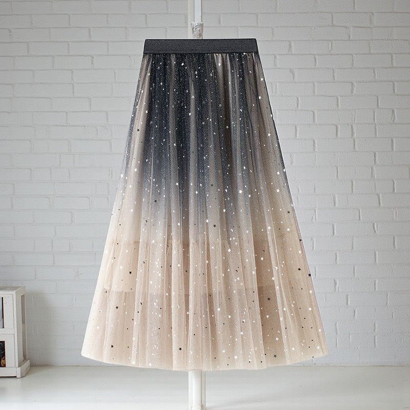ZOFIA ATELIER Mariola sequin star skirt in net yarn, featuring a gradient of dark grey to beige with scattered star sequins.