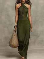 ZOFIA ATELIER olive green linen blend halter neck maxi dress with a cross-front V-neckline.