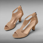 ZOFIA ATELIER tan faux fur strappy gladiator sandals with peep toe and mid-heel.