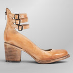 ZOFIA ATELIER tan leather high-top shoes with ankle straps, buckles, and back zipper. Round toe with square heel.