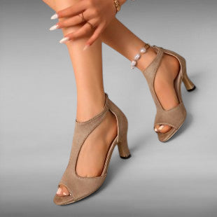 ZOFIA ATELIER taupe faux fur strappy gladiator sandals with almond toe and mid-heel.